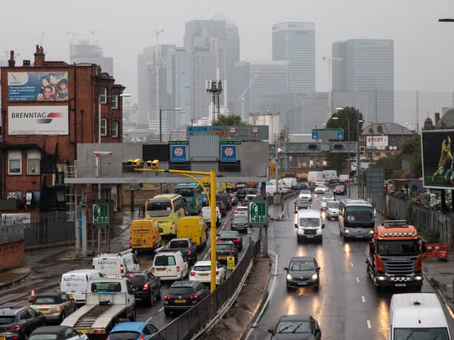 The Canary Wharf skyline is seen as vehicles queue on the Blackwall Tunnel approach in Greenwich in 2018. (Photo by Jack Taylor/Getty Images)