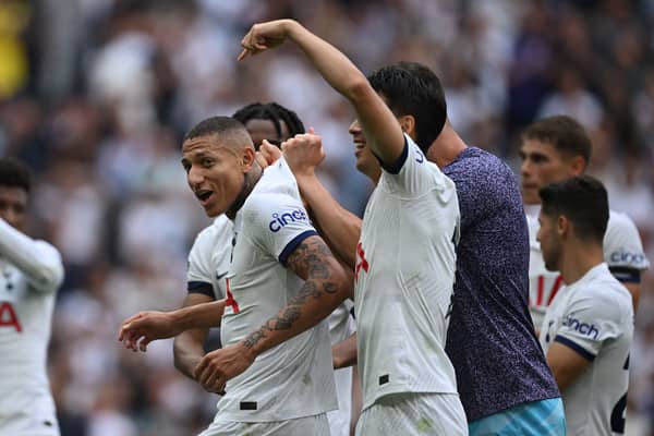 Tottenham’s Richarlison (L) and Son Heung-Min (R) celebrate their Premier League win over Sheffield United at Tottenham Hotspur Stadium   (Photo by JUSTIN TALLIS / AFP)