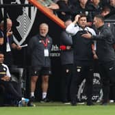 Mauricio Pochettino, Manager of Chelsea, reacts after being shown a yellow card by referee David Coote (Photo by Ryan Pierse/Getty Images)