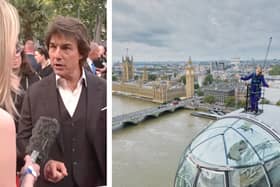 ITV News’s Sally Williams reports the weather from atop the London Eye following a challenge chosed by Tom Cruise. (Photo by Lastminute London Eye)