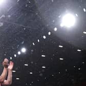 Rain falling at Arsenal’s Emirates Stadium on Wednesday evening. (Photo by Alex Pantling/Getty Images)