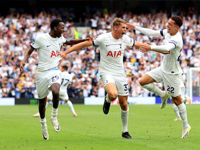 Pape Matar Sarr, Micky van de Ven and Brennan Johnson of Tottenham Hotspur celebrate after Dejan Kulusevski (Photo by Stephen Pond/Getty Images)