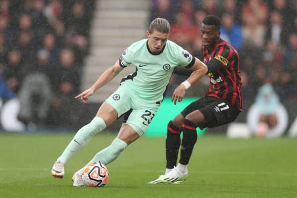 Conor Gallagher of Chelsea runs with the ball whilst under pressure from Dango Ouattara of AFC Bournemouth (Photo by Ryan Pierse/Getty Images)
