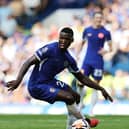 Moises Caicedo of Chelsea runs with the ball during the Premier League match between Chelsea FC and Nottingham Forest  (Photo by David Rogers/Getty Images)