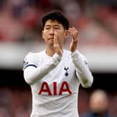  Heung-Min Son of Tottenham Hotspur applauds the fans after the draw during the Premier League match (Photo by Ryan Pierse/Getty Images)