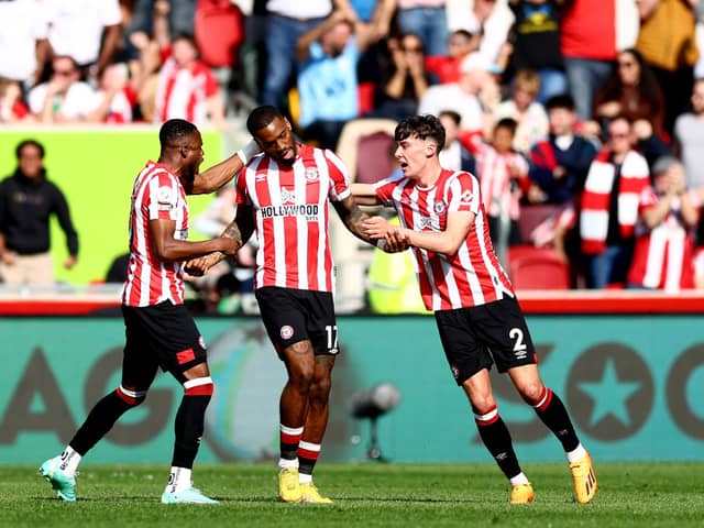  Ivan Toney of Brentford celebrates with Aaron Hickey and teammates after scoring the team’s first goal  (Photo by Clive Rose/Getty Images)