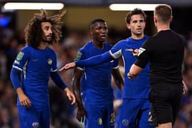 Marc Cucurella, Moises Caicedo and Ben Chilwell of Chelsea react during the Carabao Cup Third Round match  (Photo by Mike Hewitt/Getty Images)