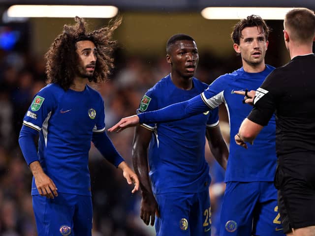 Marc Cucurella, Moises Caicedo and Ben Chilwell of Chelsea react during the Carabao Cup Third Round match  (Photo by Mike Hewitt/Getty Images)