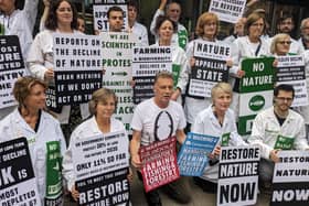 British wildlife campaigner Chris Packham at protest outside the Department for Environment, Food & Rural Affairs (DEFRA) building 