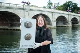 Tracey Lee holding ‘The Last Poo at the Zoo’, which was her first piece of animal poo-inspired art. Credit: Tracey Lee.