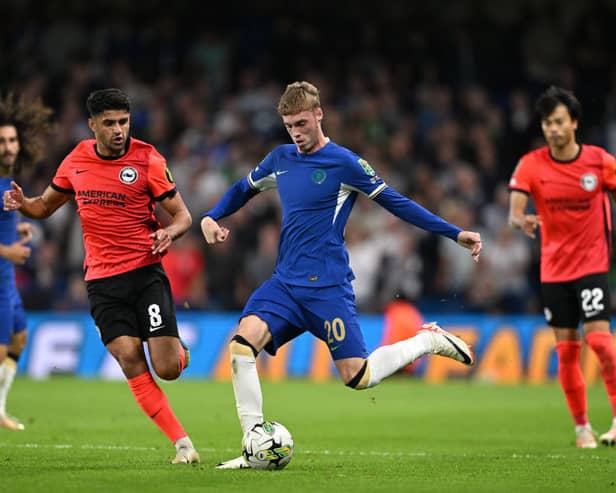 Cole Palmer of Chelsea is challenged by Mahmoud Dahoud of Brighton during the Carabao Cup Third Round match . (Photo by Mike Hewitt/Getty Images)