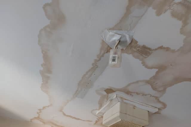 Chris Udunna said he had put tape on his ceiling after rain, and then mice, came through a gap. Credit: Ben Lynch.