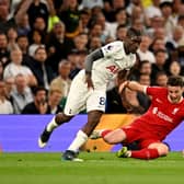 Diogo Jota of Liverpool competing with Yves Bissouma of Tottenham Hotspur during the Premier League match  (Photo by Andrew Powell/Liverpool FC via Getty Images)