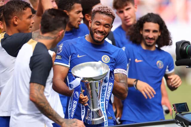  Reece James of Chelsea celebrates with the Summer Series trophy after their victory in the Premier League Summer  (Photo by Mike Stobe/Getty Images)