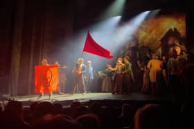 Just Stop Oil protesters on the stage of a Les Miserables performance at the Sondheim Theatre. Credit: Just Stop Oil