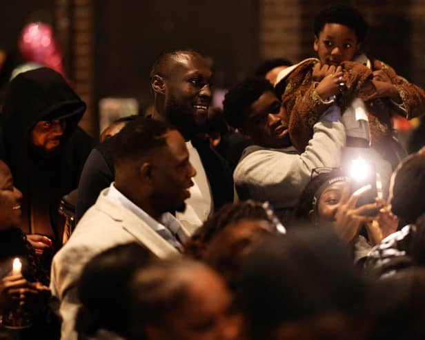 Stormzy joins family and friends at a vigil for Elianne Andam