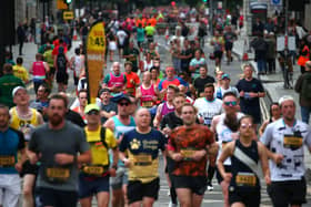 Runners taking part in a half marathon in London. Credit: Hollie Adams/Getty Images.