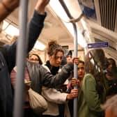 Commuters on a Piccadilly line train. Credit: Daniel Leal/AFP via Getty Images.