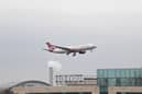A plane flying into Heathrow Airport. Credit: Justin Tallis/AFP via Getty Images.