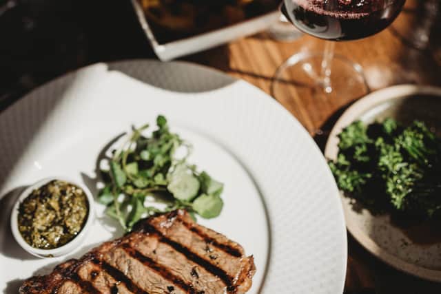 Steak and wine at The Last Judgment
