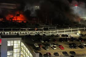 Flames could be seen from the top floor of the multi-storey car park. Credit: Bedfordshire Fire & Rescue 