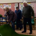 A group of pensioners attending a warm bank 