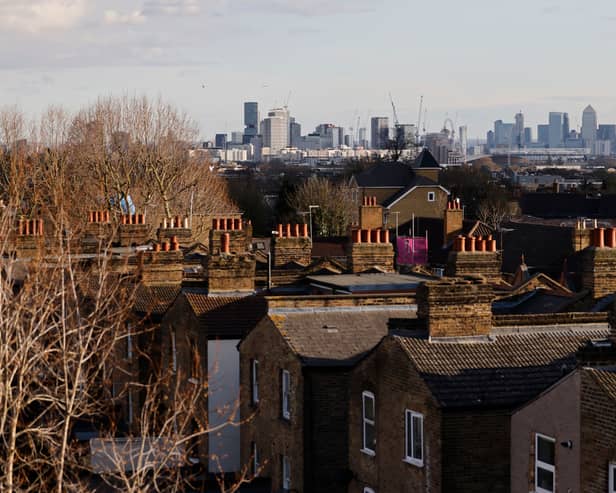 Homes in Walthamstow, with the City of London in the distance. (Photo by Tolga Akmen / AFP via Getty Images)