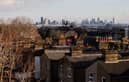 Homes in Walthamstow, with the City of London in the distance. (Photo by Tolga Akmen / AFP via Getty Images)