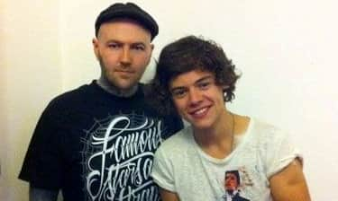 Tattoo artist Kevin Paul with Harry Styles. (Photo by Kevin Paul/SWNS)