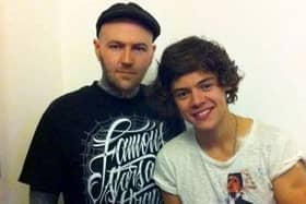 Tattoo artist Kevin Paul with Harry Styles. (Photo by Kevin Paul/SWNS)