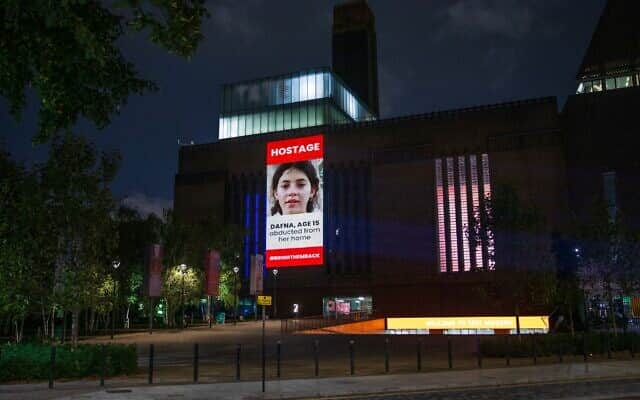 Pictures of Israeli children held hostage by Hamas have been projected onto Wembley Stadium