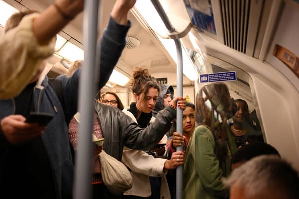 Commuters on the Underground in London. Credit: Daniel Leal/AFP via Getty Images.
