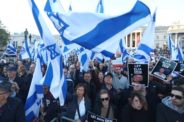 People participating in a 'Bring Them Home' solidarity rally in Trafalgar Square calling for the release of hostages held in Gaza. Credit: Peter Nicholls/Getty Images.