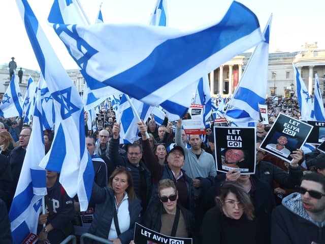 People participating in a 'Bring Them Home' solidarity rally in Trafalgar Square calling for the release of hostages held in Gaza. Credit: Peter Nicholls/Getty Images.