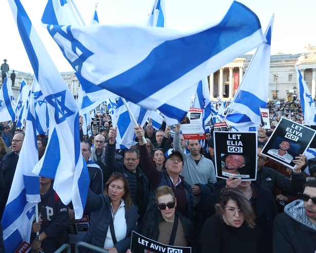 People participating in a 'Bring Them Home' solidarity rally in Trafalgar Square calling for the release of hostages held in Gaza. Credit: Peter Nicholls/Getty Images.