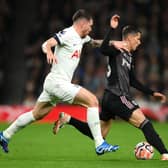 Sasa Lukic of Fulham runs with the ball whilst under pressure from Pierre-Emile Hojbjerg of Tottenham  (Photo by Justin Setterfield/Getty Images)