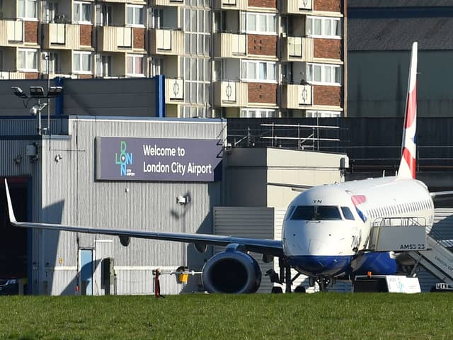 A plane sat on the tarmac at London City Airport. Credit: Ben Stansall/AFP via Getty Images.