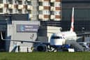 A plane sat on the tarmac at London City Airport. Credit: Ben Stansall/AFP via Getty Images.