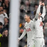 Tottenham Hotspur’s English midfielder #10 James Maddison (R) celebrates with Tottenham Hotspur’s South Korean striker   (Photo by GLYN KIRK/AFP via Getty Images)
