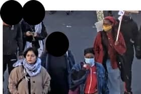 Police are appealing for help from the public to identify these three women wearing paraglider images. Credit: Met Police