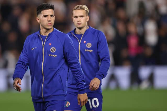 Enzo Fernandez of Chelsea and Mykhailo Mudryk of Chelsea walk out onto the pitch during the Premier League match  (Photo by Ryan Pierse/Getty Images)