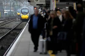 Passengers wait to board an Avanti West Coast train. (Photo by Christopher Furlong/Getty Images)