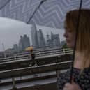 Heavy rain over Waterloo Bridge in July 2023. (Photo by Dan Kitwood/Getty Images)