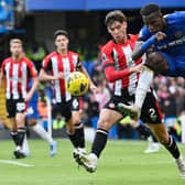 Brentford's Scottish defender #02 Aaron Hickey (2R) and Chelsea's Senegalese striker #15 Nicolas Jackson  (Photo by JUSTIN TALLIS/AFP via Getty Images)