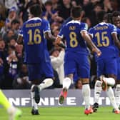 Benoit Badiashile of Chelsea celebrates with teammates after scoring the team's first goal during the Carabao  (Photo by Clive Rose/Getty Images)