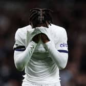 Destiny Udogie of Tottenham Hotspur reacts after a missed chance during the Premier League match (Photo by Alex Pantling/Getty Images)