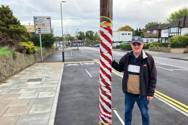 Tim Webb, 66, spotted the problematic pole in the middle of a TfL funded cycle lane. (Photo by Joe Coughlan)