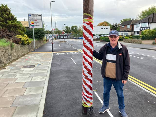 Tim Webb, 66, spotted the problematic pole in the middle of a TfL funded cycle lane. (Photo by Joe Coughlan)