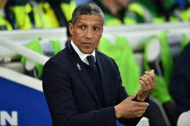 Chris Hughton reacts ahead of the English Premier League football match between Brighton and Hove Albion and Tottenham Hotspur (Photo by GLYN KIRK/AFP via Getty Images)