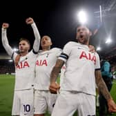 James Maddison (L), Richarlison (C) and Cristian Romero of Tottenham Hotspur celebrate after Joel Ward of Crystal Palace (Photo by Alex Pantling/Getty Images)